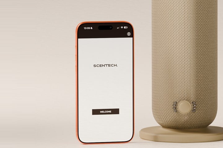 Smart Aroma Diffuser 2 neben einem Smartphone mit der Scentech-App